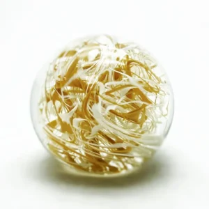 Skleněné těžítko – barevné nitě oranžovo bílé